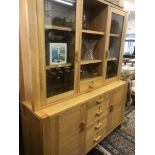 An oak glazed dresser,