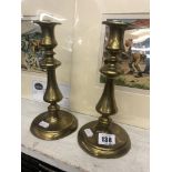 Early brass candlesticks