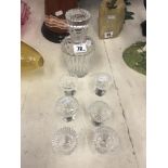 A cut glass liqueur set,