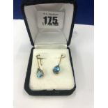 A pair of 9ct gold and Topaz earrings