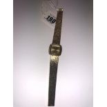 A Bueche Girod 9ct gold watch (35grams) with certificate