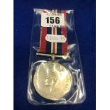 An old war medal George VI