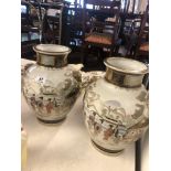 A pair of oriental vases