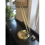 A brass desk lamp