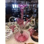 A cranberry glass epergne,