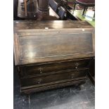 An oak bureau,