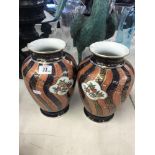 A pair of gold Imari vases