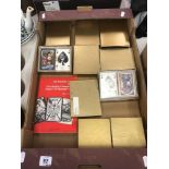 A qty of playing cards, military etc.
