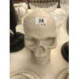 A figure of a skull