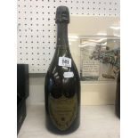 A boxed bottle of Dom Perignon,