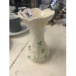 A small Belleek clover vase