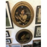 A pair of gilt framed prints