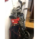 A qty of golf clubs and a trolley