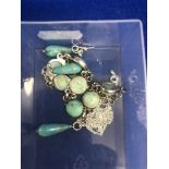 An assortment of silver and turquoise jewellery