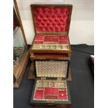 A fitted jewellery box with two drawers and a marquetry box