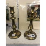 Early brass candlesticks