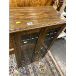 A glazed oak bookcase