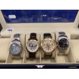 Four assorted watches including a Boxed Versace watch