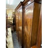 A 19th century mahogany wardrobe,