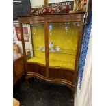 A Walnut display cabinet