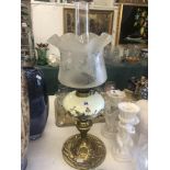 A Victorian oil lamp, hand painted font with original Victorian shade, good condition,