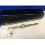 A Bueche Girod 9ct gold watch (35grams) with certificate