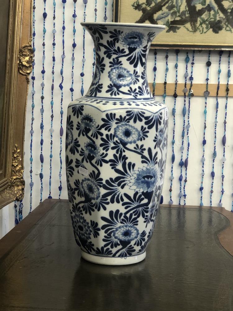 An oriental blue and white vase