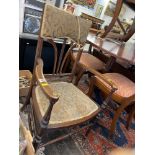 An Edwardian inlaid mahogany salon chair