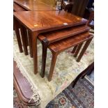 A rosewood nest of three tables