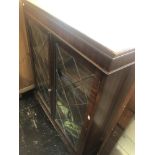 Glass fronted bookcase, with key a.