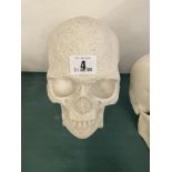 A figure of a skull