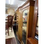 An inlaid triple Satinwood wardrobe