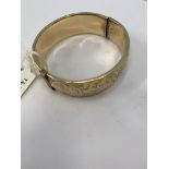 A 9ct gold bangle