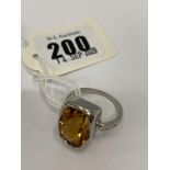 An 18ct white gold ladies single citrine stone with diamonds centre, citrine approx.