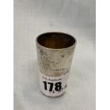 A silver shot beaker,