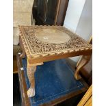 A Regency style coffee table and two carved tables