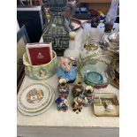 An assortment of Wade, Sylvac, Royal Doulton,