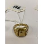 A gents 9ct gold ring, set with diamond stone, 11 grams,