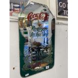 A Coca-cola advertising clock,