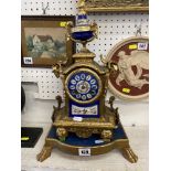 An ormulu and enamel mantle clock