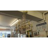 A six branch glass and metal 'Maria Theresa' chandelier,