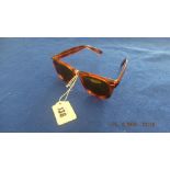 A pair of vintage Pierre Cardin sunglasses