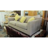 A three seater modern sofa,