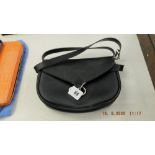 A Christian Dior ladies shoulder bag,