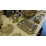 A silver plated entree dish and a silver plated tea pot