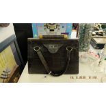 An Alligator style ladies handbag,