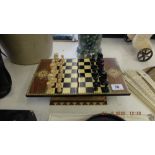 A Marquetry boxed chess set,