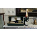 A 1990 bottle of Dom Perignon and a bottle of Bollinger