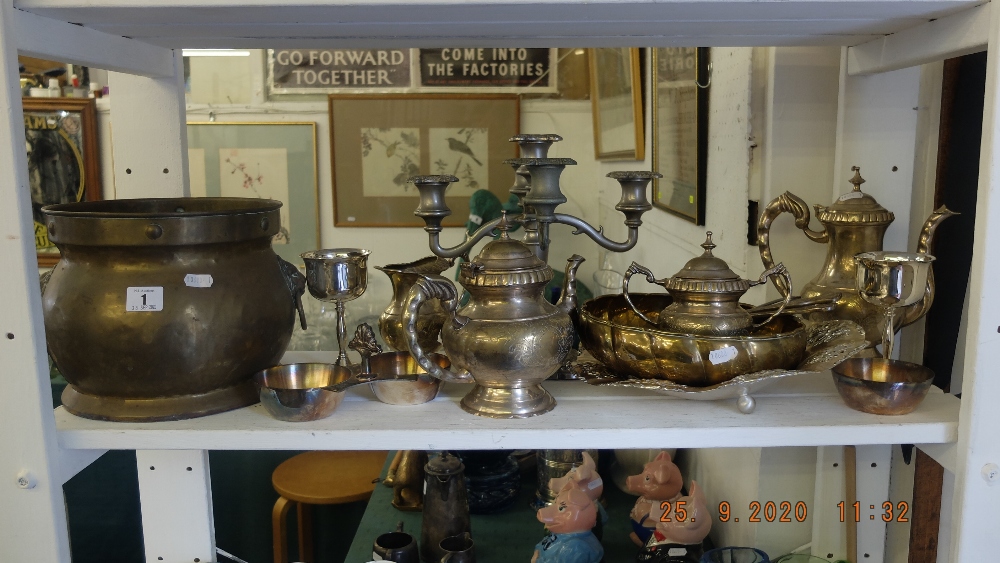 A collection of metalware; candlebra, tea set etc.