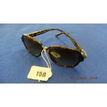 A pair of vintage tortoiseshell sunglasses by Coach